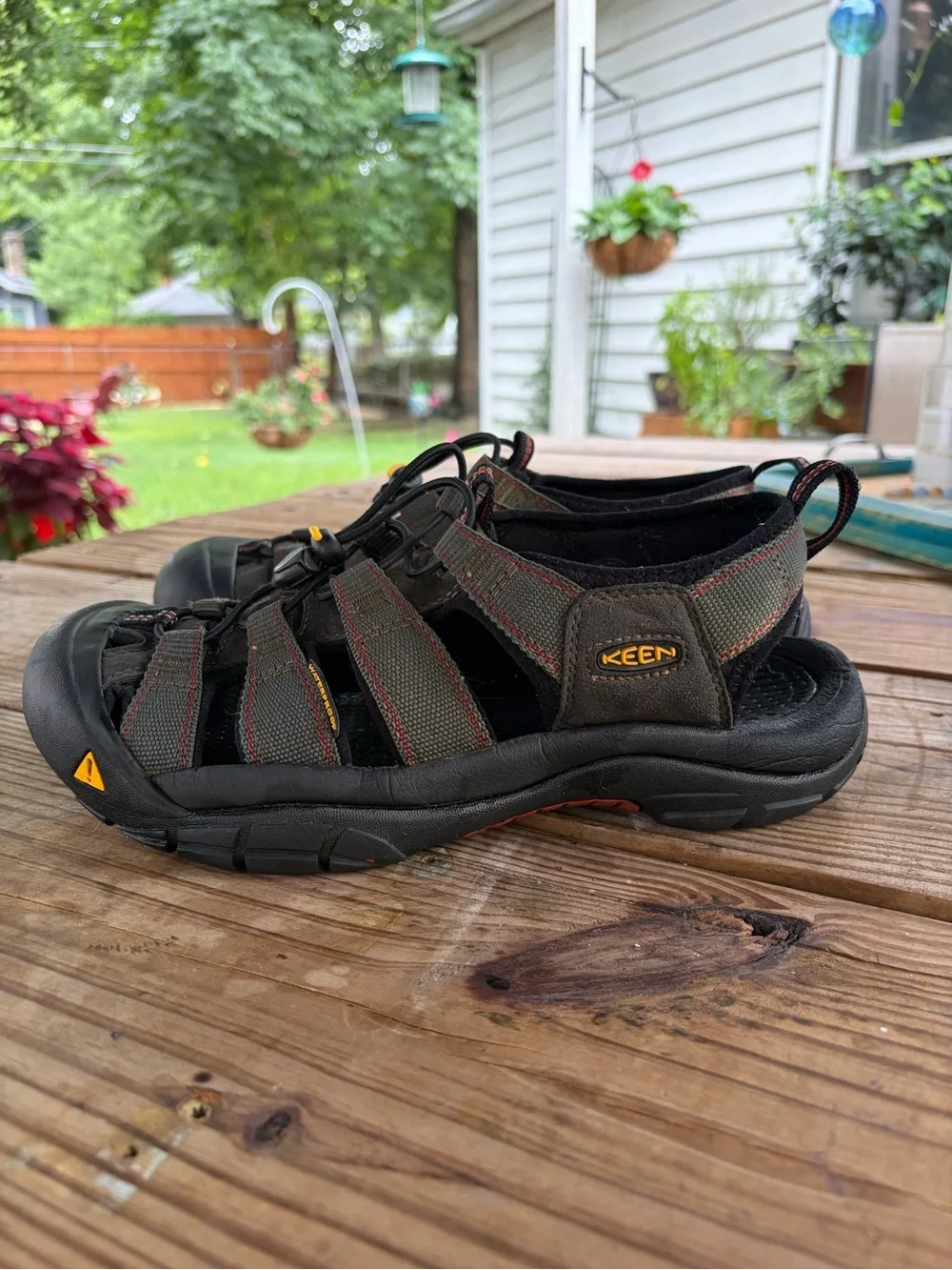 KEEN Men's Sandal in Olive Green and Black with Orange Accents